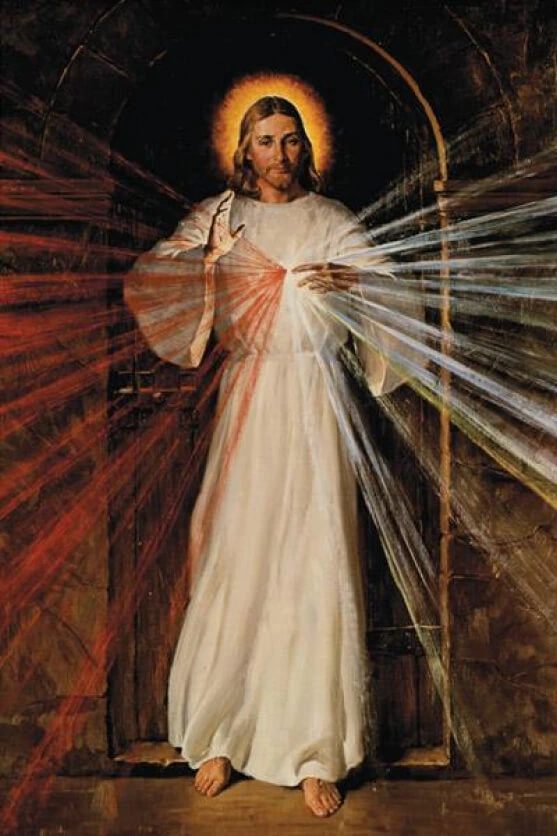 Divine Mercy Jesus wearing white robe standing in dark archway with rays of blood and water emitting from His heart, one hand raised in blessing and the other pointing towards heart from which dark red and light blue rays are emitting